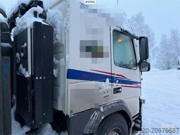 Volvo FM500 snow plough equipped tridem hook truck