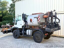 Unimog U400 mit Bitumspritze Breining + Besen