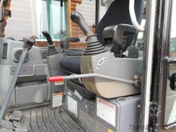 Takeuchi TB 235 mit POWERTILT