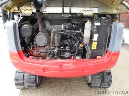 Takeuchi TB 235 mit POWERTILT