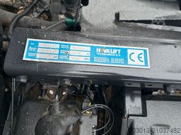 MAN TGX 26.440 Abrollkipper HYVA 20.60.S