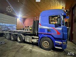 Scania R580 snow-prepared tridem hook loader with Joab ho