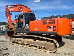 Hitachi zx350LC-3 excavator w/ toothed bucket. WATCH VIDEO