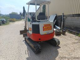 Takeuchi TB23R with 3 excavator buckets