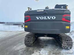 Volvo EC300EL crawler excavator w/ rototilt, cleaning an