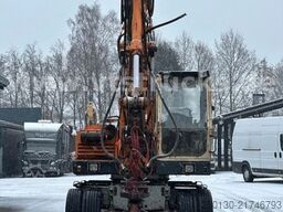 O&K MH4 Plus Mobilbagger inkl. Schalengreifer