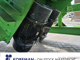 Kleemann hopper with vibrating chute