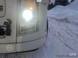 Volvo FH12 snow-plow equipped hook truck with Danish cab