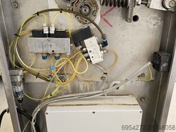 Nock Ontvliesmachine