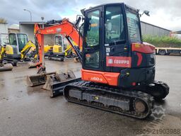 Kubota U50-5 with 3 excavator buckets