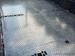  Abrollcontainer mit Bordwänden