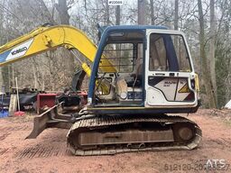 Kobelco SK60 crawler excavator with bucket