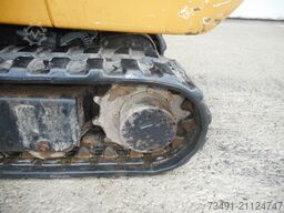 Caterpillar 300.9D mit SW + 3 Löffel