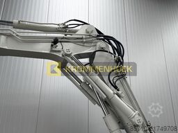 Takeuchi TB 295 W Engcon Draaikantelstuk