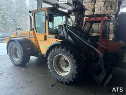 Lundberg 6200LSE wheel loader with snow blower, bucket and