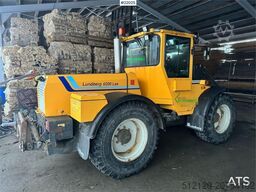 Lundberg 6200LSE wheel loader with snow blower, bucket and