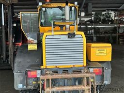 Lundberg 6200LSE wheel loader with snow blower, bucket and