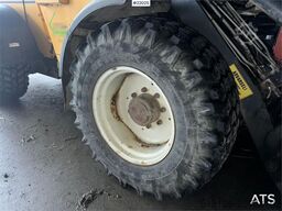 Lundberg 6200LSE wheel loader with snow blower, bucket and