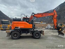 Doosan DX165W-5 wheeled machine w/ K80 hitch with electri