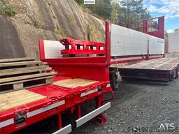 Doll Machinery Semi w/ Widening and Hydraulic Bridges.