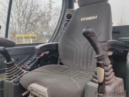 Hyundai R55W-9A with 3 excavator buckets