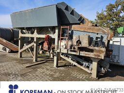 Kleemann hopper with vibrating chute