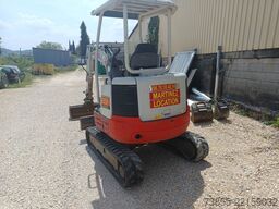 Takeuchi TB23R with 3 excavator buckets