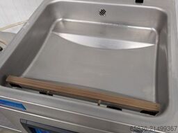 Henkovac T4 vacuum machine