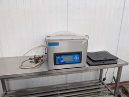 Henkovac T4 vacuum machine
