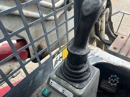 Takeuchi TL130 with forks and loader bucket