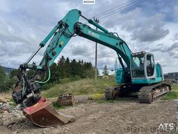 Kobelco SK235SR Tracked excavator w/ Rototilt and bucket.