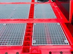 Wiese Stufensattel Tieflader mit Kran Fassi F545