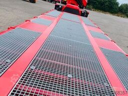 Wiese Stufensattel Tieflader mit Kran Fassi F545