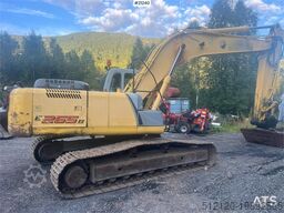 New Holland E265B Excavator w/ digging bucket and hydraulic sa