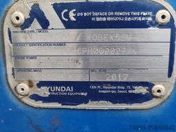 Hyundai R55W-9A with 3 excavator buckets