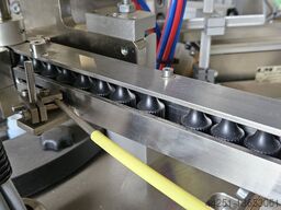  Sortier-, Zuführ- und Aufsetzmaschine