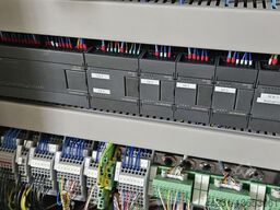  Sortier-, Zuführ- und Aufsetzmaschine