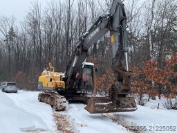 Volvo EC250DNL with 3 excavator buckets