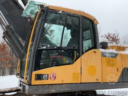 Volvo EC250DNL with 3 excavator buckets
