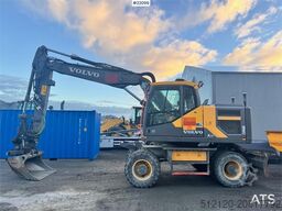 Volvo EW160E wheeled excavator with rototilt and two buc