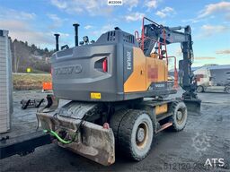 Volvo EW160E wheeled excavator with rototilt and two buc