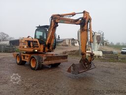 Case WX95 with 4 excavator buckets and forks