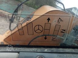 Case WX95 with 4 excavator buckets and forks