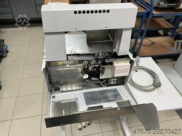 Com J240/30 Banding Machine on a Base