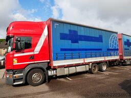 Scania R 400 6x2 curtainside in combo with Burg trailer