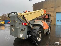JLG 4017 telehandler w/ two pallet forks and bucket. C