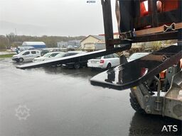 JLG 4017 telehandler w/ two pallet forks and bucket. C