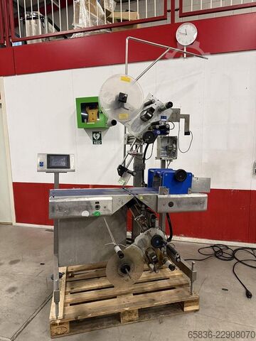 Marel top and bottom labelling machine with conveyor Marel 