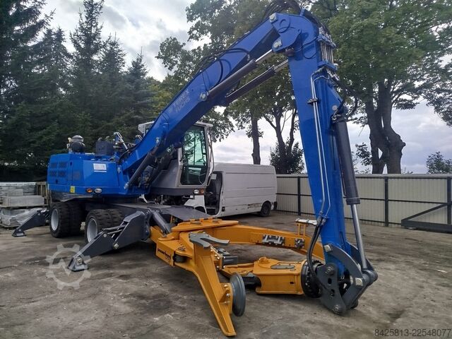 Material handler Fuchs MHL 320 D + Powerhand VRS200