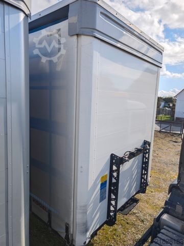 Open semitrailer with tarp KÖGEL MEGA Hubdach, Vario FIX, 1. Liftachse